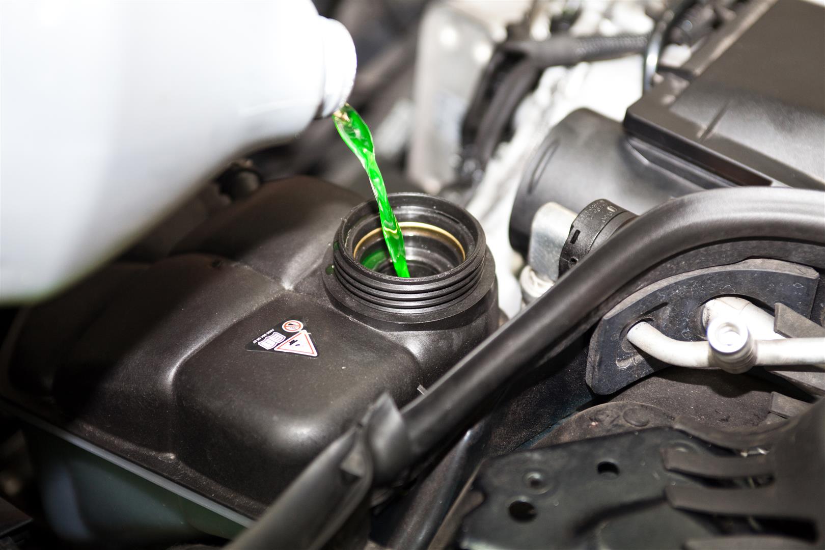 Can I Use Regular Water Instead of Engine Coolant in My Car? - Dave's  Automotive LLC.